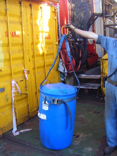 Plastic drum with curved sides with barrel span set lifting strop - poor choice as intended for metal drums