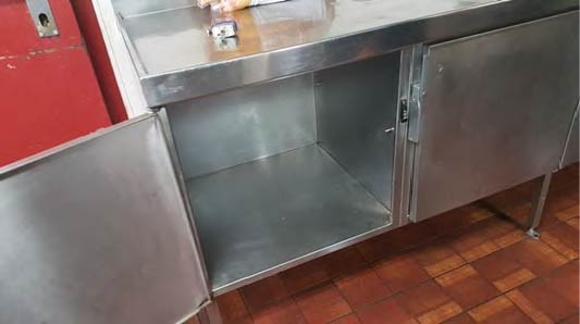 The stainless steel cupboards where the towels were kept