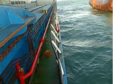 Damage to the hand rails of the barge in place